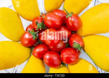Mango e pomodorini Foto Stock