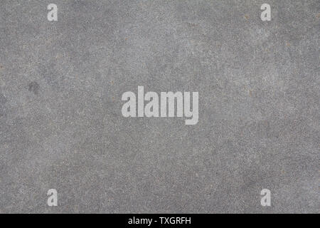 Cemento sabbiato sfondo. Liscia superficie di calcestruzzo. Grigio lucido tessitura della pietra. Foto Stock