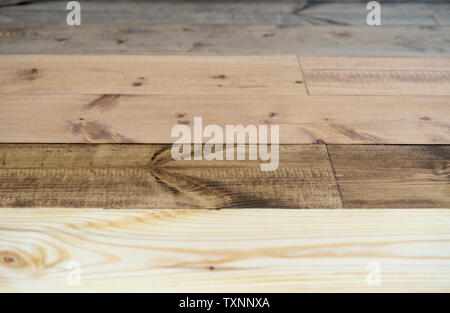 Riparazione e decorazione. Campioni di rispettosi dell'ambiente per il rivestimento di pavimenti in legno - olio-cera in diversi colori Foto Stock