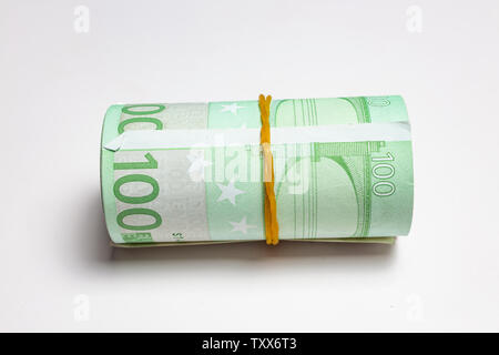 Valuta Europea; rotolo di banconote in euro Foto Stock