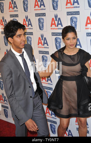 LOS ANGELES, CA. Novembre 05, 2009: Dev Patel & Freida Pinto al XVIII Premio BAFTA annuale/la Britannia Awards allo Hyatt Century Plaza Hotel, Century City. © 2009 Paul Smith / Featureflash Foto Stock