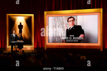 L'Oscar nomination per Best Director compresi David O. Russell per 'American Hustle' sono annunciate da attore Chris Hemsworth (L) e l'Accademia delle Arti e delle scienze cinematografiche Presidente Cheryl Boone Isaacs al Samuel Goldwyn Theater di Beverly Hills, la California il 16 gennaio 2014. La 86annuale di Academy Awards si svolgerà il 2 marzo. UPI/Jim Ruymen Foto Stock