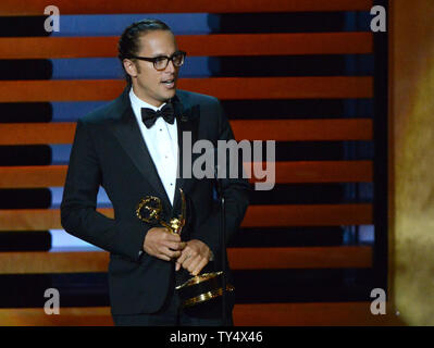 Cary Fukunaga accetta il premio per il miglior regia per una serie di dramma per il suo lavoro su "vero detective' - 'chi ci va' durante il Primetime Emmy Awards presso il Nokia Theatre di Los Angeles il 25 agosto 2014. UPI/Pat Benic Foto Stock