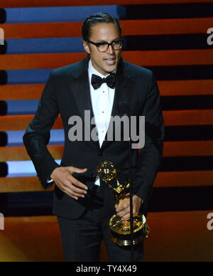 Cary Fukunaga accetta il premio per il miglior regia per una serie di dramma per il suo lavoro su "vero detective' - 'chi ci va' durante il Primetime Emmy Awards presso il Nokia Theatre di Los Angeles il 25 agosto 2014. UPI/Pat Benic Foto Stock