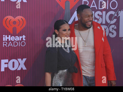 (L-R) Zena Foster e serbatoio arriva per il sesto convegno annuale iHeartRadio Music Awards presso il Microsoft Theatre di Los Angeles, la California il 14 marzo 2019. Il premio annuale show sarà trasmesso in diretta su FOX. Foto di Jim Ruymen/UPI Foto Stock