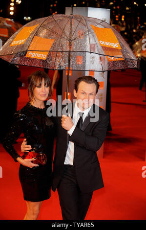 Attore americano Christian Slater e British Fashion mogul Tamara Mellon frequentare il "Orange British Academy Film Awards" presso la Royal Opera House di Londra il 8 febbraio 2009. (UPI foto/Rune Hellestad) Foto Stock