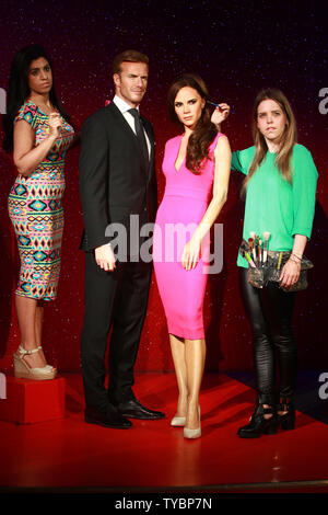 Nuovo waxworks del calciatore britannico/modello David Beckham e il cantante/designer Victoria Beckham sono svelata al museo delle cere di Madame Tussauds a Londra il 19 giugno 2014. UPI/ Rune Hellestad Foto Stock