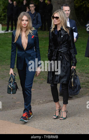 I modelli inglesi Cara Delevingne e Kate Moss frequentare Burberry Prorsum Primavera / Estate 2015 sfilata a Londra il 15 settembre 2014. UPI/ Rune Hellestad Foto Stock
