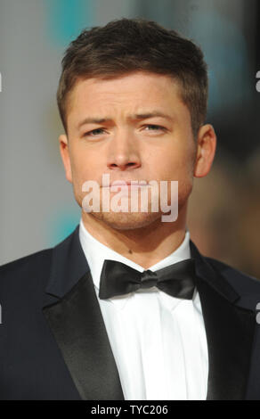 Attore gallese Taron Egerton assiste l'EE British Academy Film Awards 2016 presso la Royal Opera House di Londra il 14 febbraio 2016. Foto di Paul Treadway/ UPI Foto Stock