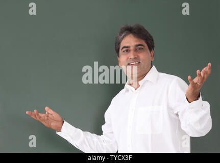Maestro di una lezione in aula Foto Stock