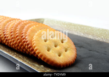 Il salato, croccanti e gustosi biscotti per la colazione del mattino Foto Stock