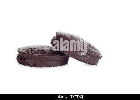 Due piccoli ricoperti di cioccolato torte a base di pan di spagna Foto Stock