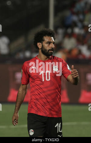 Il Cairo, Egitto. Il 26 giugno, 2019. Dell'egitto Mohamed Salah reagisce durante il 2019 Africa Coppa delle Nazioni di una partita di calcio tra Egitto e la Repubblica democratica del Congo al Cairo International Stadium. Credito: Gehad Hamdy/dpa/Alamy Live News Foto Stock