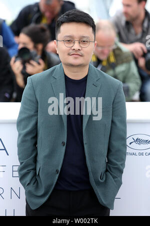 Il Gan Bi arriva a un photocall per il film 'lunga giornata di viaggio nella notte (di qui Zui Hou De Ye Wan)' durante la settantunesima annuale internazionale di Cannes Film Festival di Cannes, Francia il 16 maggio 2018. Foto di David Silpa/UPI Foto Stock