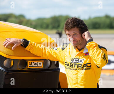 Guy Martin. JCB Agri-produce macchinari per la realizzazione di una nuova British record di velocità per un trattore di 103,6 mph, battendo il precedente 87.27 mph set di record in Foto Stock