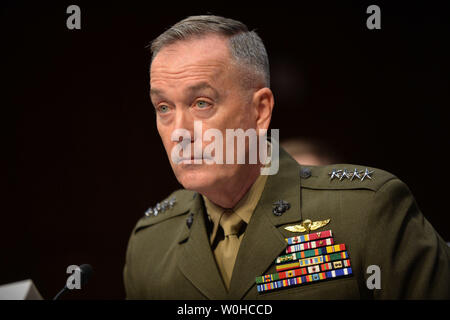 Gen. Giuseppe Dunford Jr., comandante della forza internazionale di assistenza alla sicurezza, testimonia in Afghanistan durante un Senato Comitato delle Forze Armate audizione su Capitol Hill su Marzo 12, 2014 a Washington D.C. UPI/Kevin Dietsch Foto Stock