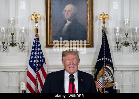 Presidente Donald Trump offre commento sulla crisi umanitaria al confine meridionale e l'arresto in Sala Diplomatica della Casa Bianca 19 gennaio 2019. Foto di Ken Cedeño/UPI Foto Stock
