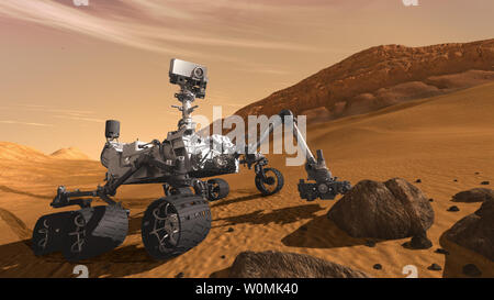Questo artista concetto caratteristiche di NASA Mars Science Laboratory curiosità rover, un robot mobile per studiare Marte' passato o presente la capacità di sostenere la vita microbica. Il razzo che trasportano la curiosità ha lanciato il 26 novembre 2011. UPI/NASA/JPL-Caltech Foto Stock