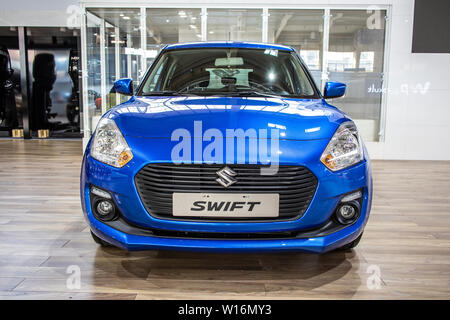 Poznan, Polonia, Marzo 2019: blu nuova Suzuki Swift, Poznan International Motor Show, gen 4, auto ultracompatto che sta B segmento prodotta da Suzuki Foto Stock