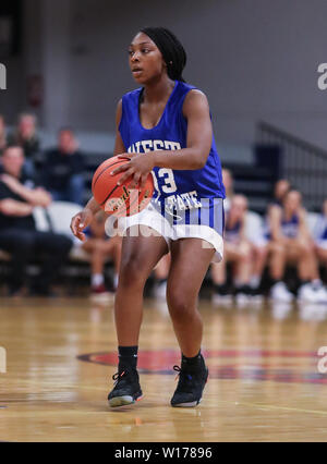 Azione di basket presso il Washington State 2A e 3A TUTTE LE Star Game in Liberty Lago, Washington. Foto Stock