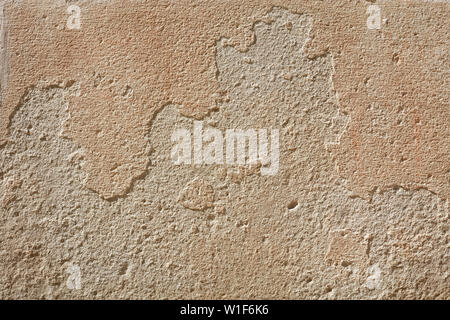 Vecchio beige parete scheggiata sfondo texture Foto Stock