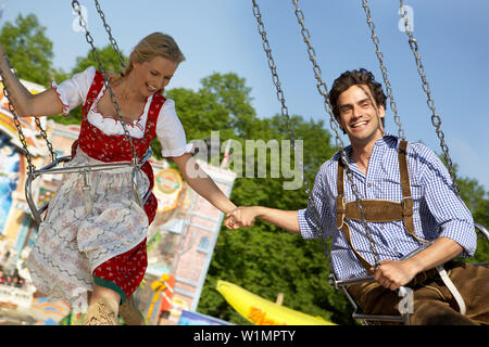 Matura in un chairoplane Foto Stock