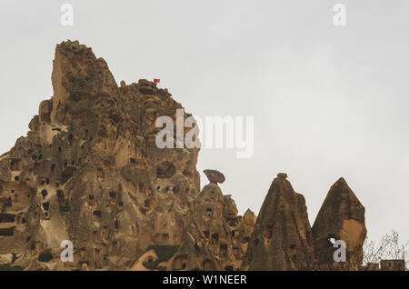 Le abitazioni nella roccia di tufo vulcanico in Cappadocia, centrale la Turchia. Goreme National Park. Foto Stock