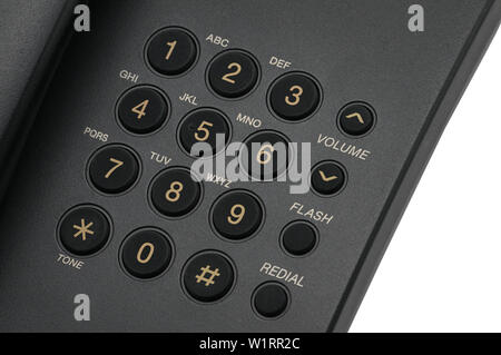 Classico telefono cablato utilizzati a casa e negli uffici su un isolato bianco sullo sfondo. Foto Stock