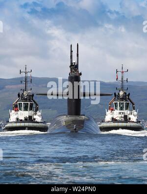 Gli Stati Uniti Navy Ohio-classe-balistico missile submarine USS Alaska arriva per una porta visita al Royal Navy Base Clyde Luglio 2, 2019 a Faslane in Scozia. Foto Stock