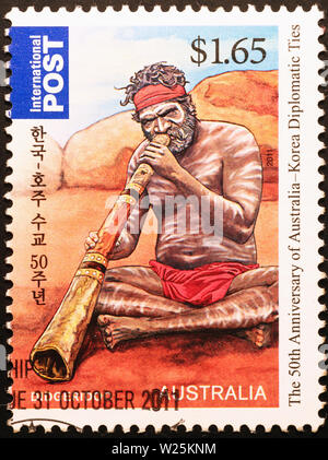 Aborigeno australiano sul bel francobollo Foto Stock