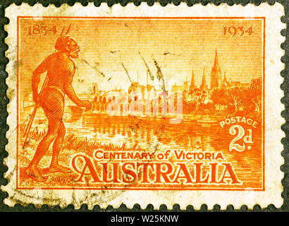 Aborigeno australiano e Victoria su antiche francobollo Foto Stock