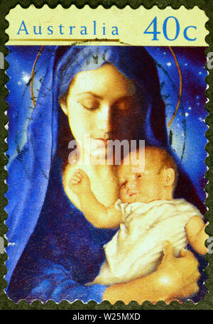 La Madonna e il bambino su australian francobollo Foto Stock