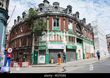 Snow Hill parte basale del generale Smithfield Market Building all'angolo di Farringdon Road e West Smithfield Street, London EC1 Foto Stock