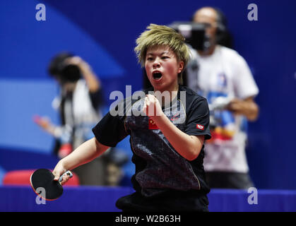 Napoli, Italia. 7 Luglio, 2019. Wang Yidi della Cina reagisce durante una partita di tennis da tavolo donne squadra concorrenza tra la Cina e il Giappone a Napoli, Italia, il 7 luglio 2019. Credito: Shan Yuqi/Xinhua/Alamy Live News Foto Stock