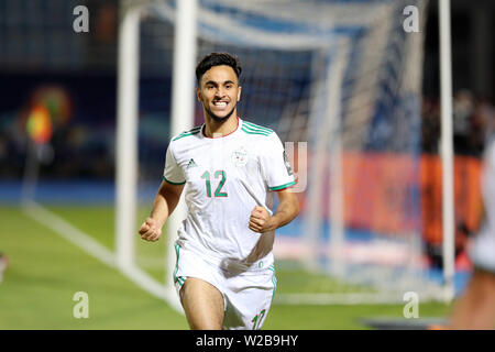 Il Cairo, Egitto. 7 Luglio, 2019. Adam Ounas di Algeria celebra rigature durante il 2019 Africa Coppa delle Nazioni match tra Algeria e Guinea al Cairo, in Egitto, il 7 luglio 2019. L' Algeria ha vinto 3-0. Credito: Ahmed Gomaa/Xinhua/Alamy Live News Foto Stock