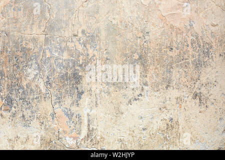 Vecchio scheggiate e sbiadita parete sfondo texture in Italia Foto Stock