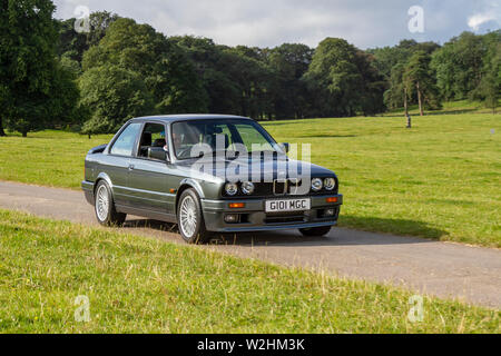 1989 80s Bmw 325 i Sport grigio anni ottanta al classico show di auto ha viaggiato Carnforth per mostrare più classici, storici, motori d'epoca e collezionabili alla fiera Leighton Hall di quest'anno, un'opportunità per vedere oltre 500 veicoli classici del passato in uno degli spettacoli più completi e diversificati nell'evento estivo di auto classiche. Foto Stock