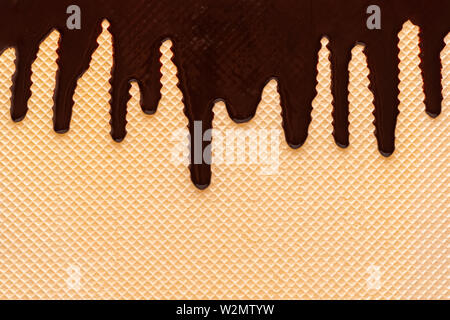 Golden waffle texture con glassa di cioccolato come sfondo per il vostro design Foto Stock