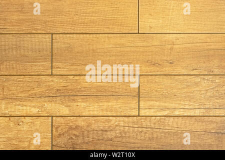 Frammento di pavimento con parquet da piastre di legno, per l'uso come una trama e un abstract background. Foto Stock