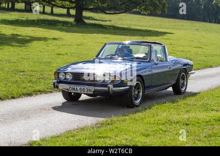 Trionfo Stag classic vintage restaurati i veicoli storici auto arrivando a Leighton Hall car show in Carnforth, Lancaster, Regno Unito Foto Stock