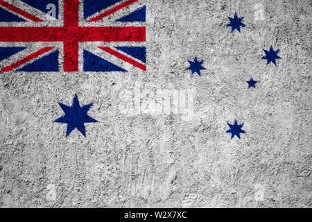 Bandiera della Marina Ensign of Australia dipinta sulla parete di cemento frantumata Foto Stock