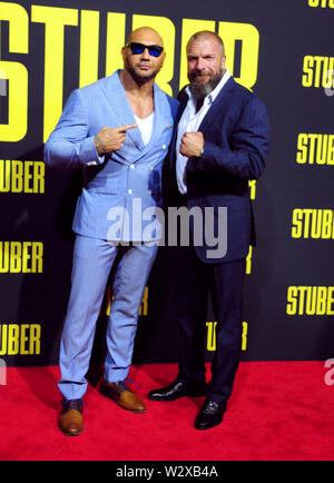 Los Angeles, California, Stati Uniti d'America 10 luglio 2019 lottatore/attore Dave Bautista e wrestler attore/Triple H, aka Paul Michael Levesque assiste XX Century Fox "tuber' Premiere sulla luglio 10, 2019 a Regal Cinemas L.A. Vive a Los Angeles, California, USA. Foto di Barry re/Alamy Live News Foto Stock