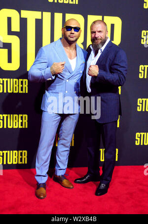 Los Angeles, California, Stati Uniti d'America 10 luglio 2019 lottatore/attore Dave Bautista e wrestler attore/Triple H, aka Paul Michael Levesque assiste XX Century Fox "tuber' Premiere sulla luglio 10, 2019 a Regal Cinemas L.A. Vive a Los Angeles, California, USA. Foto di Barry re/Alamy Live News Foto Stock