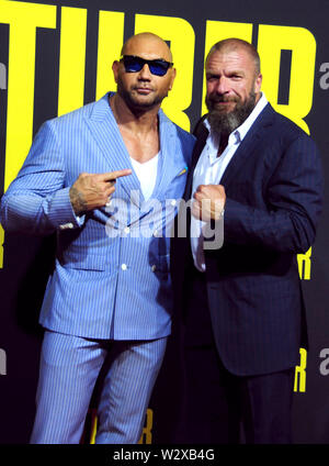 Los Angeles, California, Stati Uniti d'America 10 luglio 2019 lottatore/attore Dave Bautista e wrestler attore/Triple H, aka Paul Michael Levesque assiste XX Century Fox "tuber' Premiere sulla luglio 10, 2019 a Regal Cinemas L.A. Vive a Los Angeles, California, USA. Foto di Barry re/Alamy Live News Foto Stock