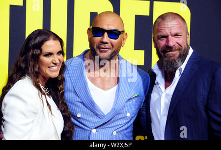 Los Angeles, California, Stati Uniti d'America 10 luglio 2019 Chief Brand Officer di WWE Stephanie McMahaon, attore Dave Bautista e wrestler attore/Triple H, aka Paul Michael Levesque frequentare XX Century Fox "tuber' Premiere sulla luglio 10, 2019 a Regal Cinemas L.A. Vive a Los Angeles, California, USA. Foto di Barry re/Alamy Live News Foto Stock