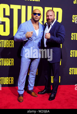 Los Angeles, California, Stati Uniti d'America 10 luglio 2019 lottatore/attore Dave Bautista e wrestler attore/Triple H, aka Paul Michael Levesque assiste XX Century Fox "tuber' Premiere sulla luglio 10, 2019 a Regal Cinemas L.A. Vive a Los Angeles, California, USA. Foto di Barry re/Alamy Live News Foto Stock