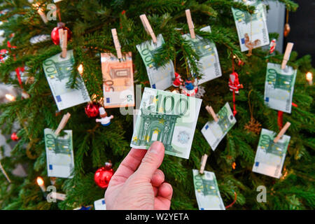 Albero di natale, donazione, dono del denaro Foto Stock