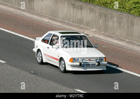 Ford Escort RS Turbo; Vintage classic historics collezionismo auto Viaggiare sulla autostrada M6 Foto Stock