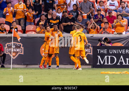 Texas, Stati Uniti d'America. 12 Luglio, 2019. 12 luglio 2019 : Houston Dynamo avanti Romell Quioto (31) celebra il suo obiettivo con compagni di squadra durante una partita tra Los Angeles FC e Houston Dynamo BBVA Stadium di Houston, Texas. A metà è tie 1-1. Credito: Cal Sport Media/Alamy Live News Foto Stock