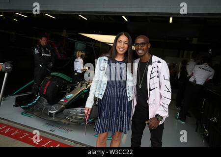 Silverstone, UK. 14 Luglio, 2019. &#Xa9; Foto4/LaPresse14/07/2019 Silverstone, Inghilterra Sport Gran premio di Formula Uno Inghilterra 2019 nel pic: griglia di partenza, Sir Mo Farah (GBR) atleta con la consorte signora Tania Farah (GBR) Credito: LaPresse/Alamy Live News Foto Stock